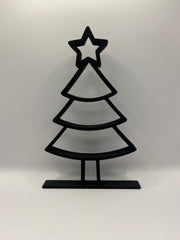 Zwarte minimalistische kerstboom staande decoratie met ster, weergegeven tegen een lichte achtergrond.