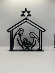 Moderne kerststal in silhouetstijl met ster, Jozef, Maria en kindje Jezus