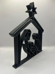 Zijaanzicht van de Xmas Deco – Kerststal met strak silhouet en ster