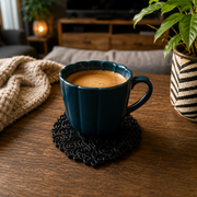 Zwarte leeuw onderzetters set van 6 met elegant design voor bescherming tegen kringen van koffie- en theekopjes.