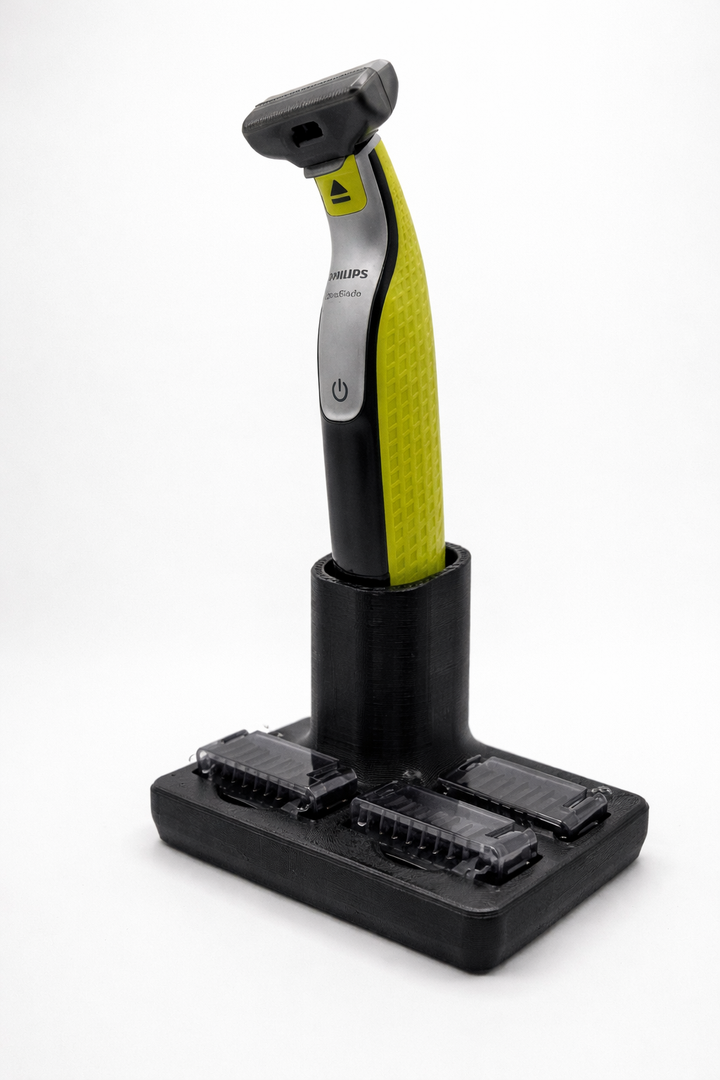 Detail van zwarte OneBlade houder met oplaadfunctie en opbergvakken voor opzetstukken