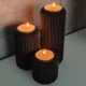 Waxinelichthouders met subtiele geribbelde structuur in drie maten, beschikbaar als individuele items en set.
