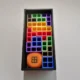 Handzame Tetris Reiseditie van hout, ontworpen voor puzzelplezier onderweg, van HunoBa Creative.