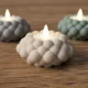 Waxinelichthouder Bubbel met bubbeldesign die een warm en sfeervol licht verspreidt.