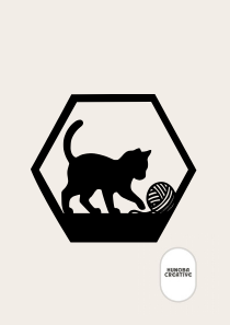 Wanddecoratie kat met bolletje wol in zeshoekig silhouetframe